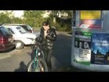 Enni riding the bicycle wearing a sexy shiny nylon shorts beneath the jeans and a downjacket on naked skin (Video)