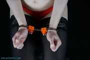 Mitzi in lingerie and high security handcuffed
