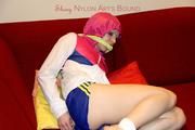 A nice cuty tied and gagged in shiny nylon shorts