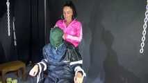 Sexy Ajyana being tied, gagged, hooded and dominated by Stella wearing sexy shiny nylon rainwear on a hairdresser´s chair Part 2 of 2 (Video)