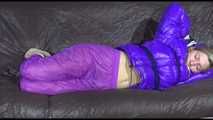 ***HOT SANDRA*** tied, gagged and hooded with ropes and a cloth gag on bed wearing a sexy purple shiny nylon down jacket and a rain pant (Video)
