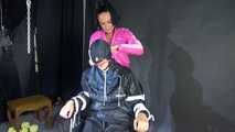 Sexy Ajyana being tied, gagged, hooded and dominated by Stella wearing sexy shiny nylon rainwear on a hairdresser´s chair Part 2 of 2 (Video)