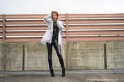 Miss Petra in transparent Hunter rain jacket and patent leggings