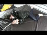 03:00 Min. video with Shelly tied and gagged in a shiny nylon down jacket