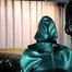 Slave in Rubber Cape