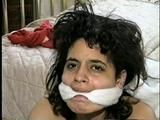 18 Yr OLD LATINA ZARR IS GAGGED WITH SWEATY STINKY NYLONS, TIED WITH LEATHER BELTS, CLEAVE GAGGED, BAREFOOT, BALL-TIED & HANDGAGGED (D54-8)
