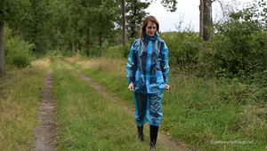 Miss Petra goes for a walk in PVC raingear and rubber boots