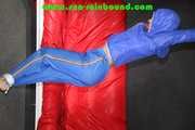 Sexy Sonja being tied and gagged overhead wearing a sexy shiny nylon rainwear combination (Pics)