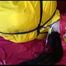 Lucy tied, gagged and hooded on a sofa with dark ropes wearing a sexy yellow rainwear combination (Video)