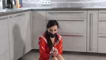 Miss Amira is bound and gagged in a schoolgirl costume