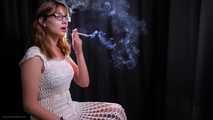 18 y.o. Lyuba is smoking cigarettes wearing a white dress 