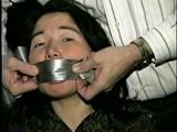 25 YEAR OLD ASIAN MAI-LING IS MOUTH STUFFED, CLEAVE GAGGED, HANDGAGGED, OTM GAGGED, TAPE GAGGED & TIGHTLY TIED TO A CHAIR  (D47-15)