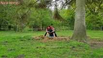 Rubber boot mistress presses slave face into manure