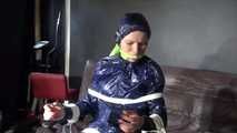 See Ronja tied and gagged on a Barber Chair in shiny nylon Rainwear and a shiny cape!