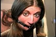 27 YEAR OLD SPOILED BRAT REAL ESTATE MANAGER IS RING-GAGGED, TOPLESS, TIT TIED, DROOLING, BALL-GAGGED, HOPS AROUND WHILE WEARING PANTYHOSE AND HIGH LEATHER BOOTS (D68-8)