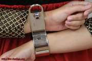 Damsel Sophia cuffed with special rigid cuffs