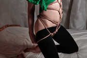 Shibari jute karada in green shirt and black leggings