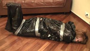 [From archive] Stella - hogtaped and packed into the trash bag (video)