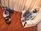 Alexa & Catt - Brown-haired beauty gets hogtied next to her tied-up girlfriend