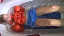Watching SEXY SANDRA wearing a sexy lightblue oldschool shiny nylon shorts and an orange downjacket diving in the bathtub for a very special friend :-) (Video)