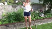 Watching sexy SANDRA wearing a darkblue/white striped  shiny nylon shorts and a top while gardening outdoor (Video)