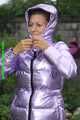 Watch Sandra taking a shower in her new purple shiny nylon down jacket 