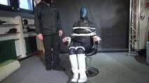 Lady M bound and gagged in Rainwear, white Rubberboots and Latexhood