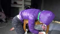 Watching Sonja wearig a sexy blue rainpant and a purple down jacket being tied, gagged and hooded on a stool with ropes and a cloth gag (Video)