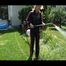 Pia wearing a sexy black/pink adidas sweat suit while watering the flowers in the garden (Video)