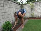 Get a video with Sandra gardening in her shiny nylon Downvest