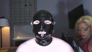 Huge rubber hands in the gimp’s mouth