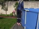 Watch Chloe cleaning the Pool in her shiny nylon Rainwear