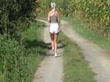 Watch Chloe taking a walk with her shiny nylon Shorts