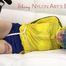 Mara tied and gagged on a white sofa wearing a sexy blue/yellow shorts and a yellow rain jacket (Pics)