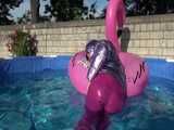 Watch Sandra enjoying her shiny nylon Downwear at a warm Summer Day in the Garden and in the Pool