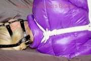 Pia tied and gagged with ropes and a ballgag with eye patches wearing a sexy crazy sensation down pants and a purple down jacket (Pics)
