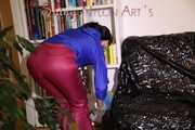 Sexy Mara wearing a sexy purple shiny nylon pants and a blue shiny nylon jacket during dedusting the shelf (Pics)