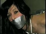 40 Yr OLD HAIRDRESSER PANTY MOUTH STUFFED, TAPE GAGGED, HOG-TIED, TOE-TIED & CROTCH ROPED ON BED (D38-4)