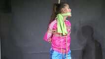 Marie M bound and gagged in shiny nylon Jacket and Shorts