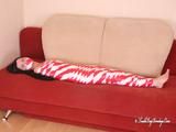 [From archive] Marvita mummified in red and white duct tape