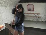 Jill Diamond cleaning up a cellar while wearing sexy shiny nylon shorts (Video)