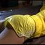Lucy tied and gagged on a bed wearing a supersexy rarely yellow shiny nylon shorts and a yellow rain jacket (Video)