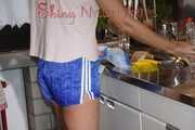 Watching sexy Pia wearing a sexy blue shiny nylon shorts and a tshirt doing her housework (Pics)