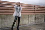 Miss Petra in transparent Hunter rain jacket and patent leggings