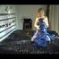 Pia wearing a shiny nylon rain pants and a bra dressing herself with a blue PAMY down jacket and lolling on bed (Video)