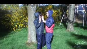 Jill and a friend of her playing with eachother both wearing sexy shiny nylon rain pants and jackets (Video)