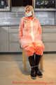 Miss Francine in AGU raingear and transparent raingear (original AGU) bound and gagged on a chair