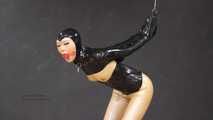 Gagged rubber doll in monogloves