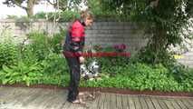 Watching sexy Sandra wearing sexy shiny nylon rainwear gardening outside (Video)