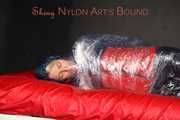 Sonja being tied, gagged and hooded with plastic wrap wearing a sexy shiny nylon rainwear combination (Pics)